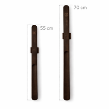 Wall mounted wooden shoe horn with magnetic holder for convenient storage